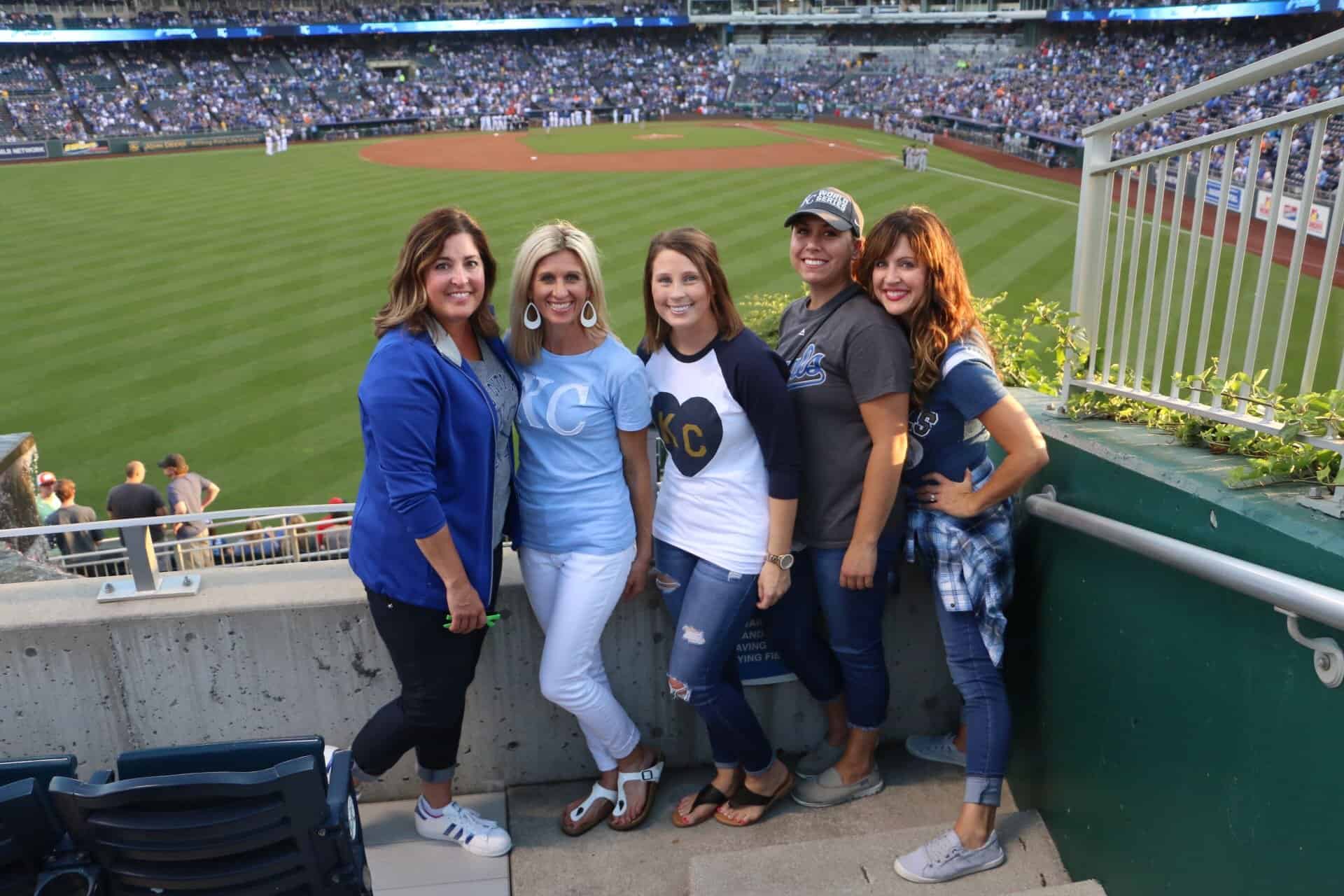 outfield-group-royals  - Braces and Invisalign in Kansas City, Overland Park, Olathe, and Paola, Kansas - Oltjen Orthodontics
